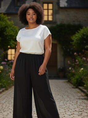 Sheer overlay lined black elastic waist dress pants. 22w dressbarn